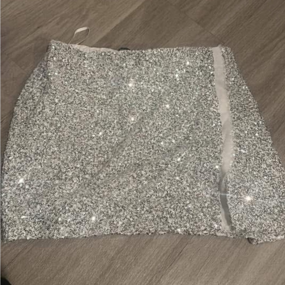 Sparkling Silver Sequin Mini Skirt , never worn , need gone !